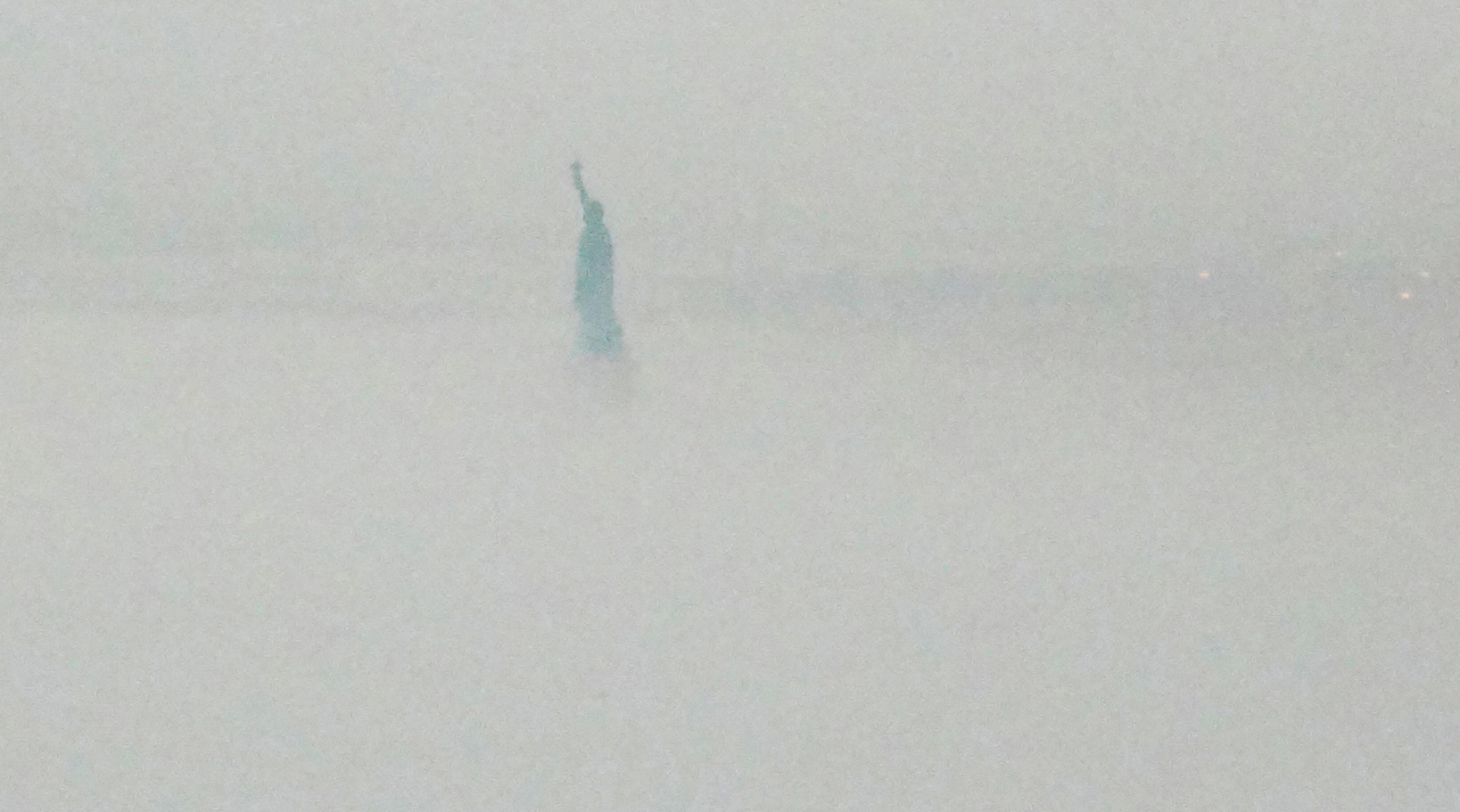 Staue of Liberty fog close crop
