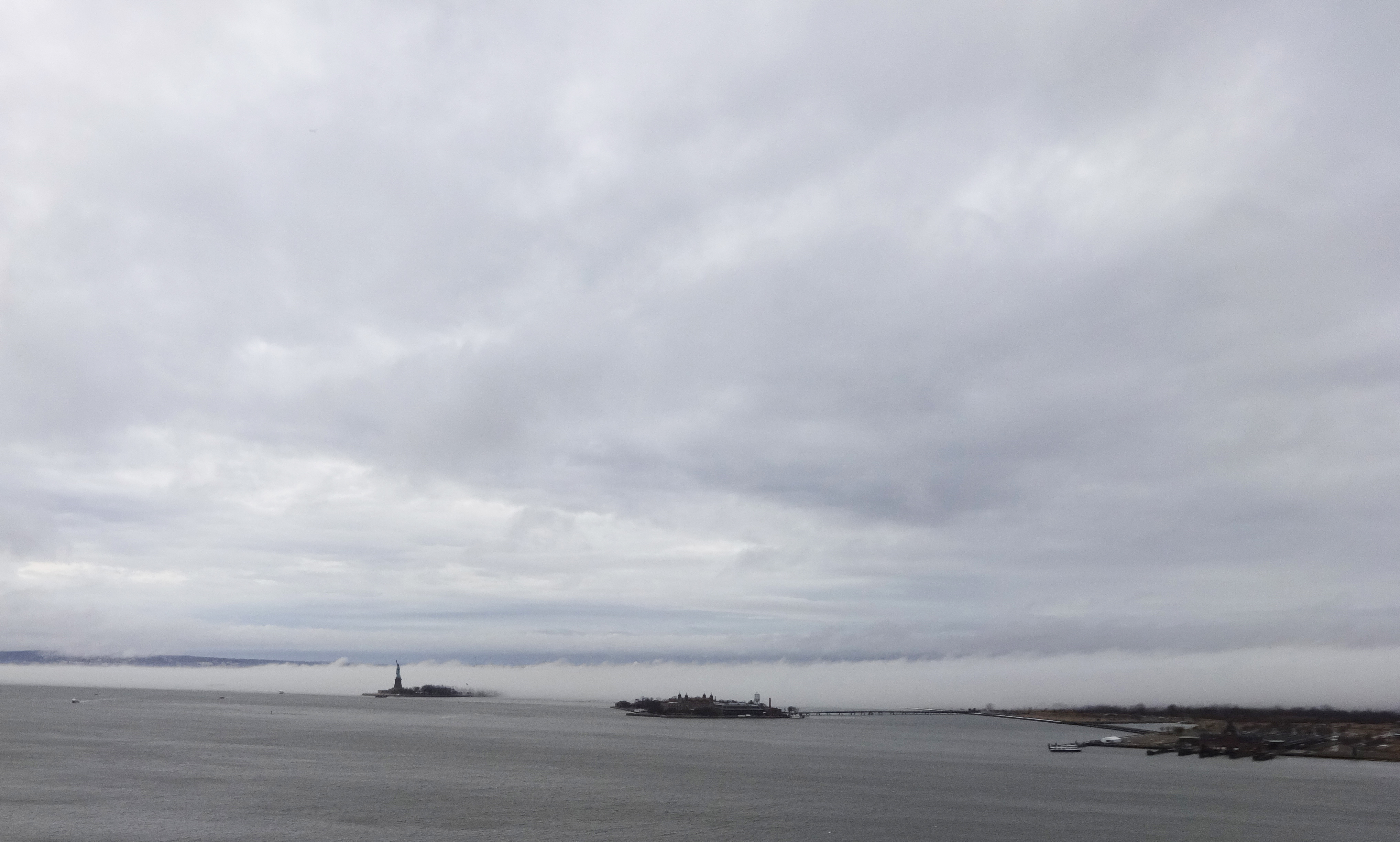 Fog behind Statue of Liberty wide 1-11-2014