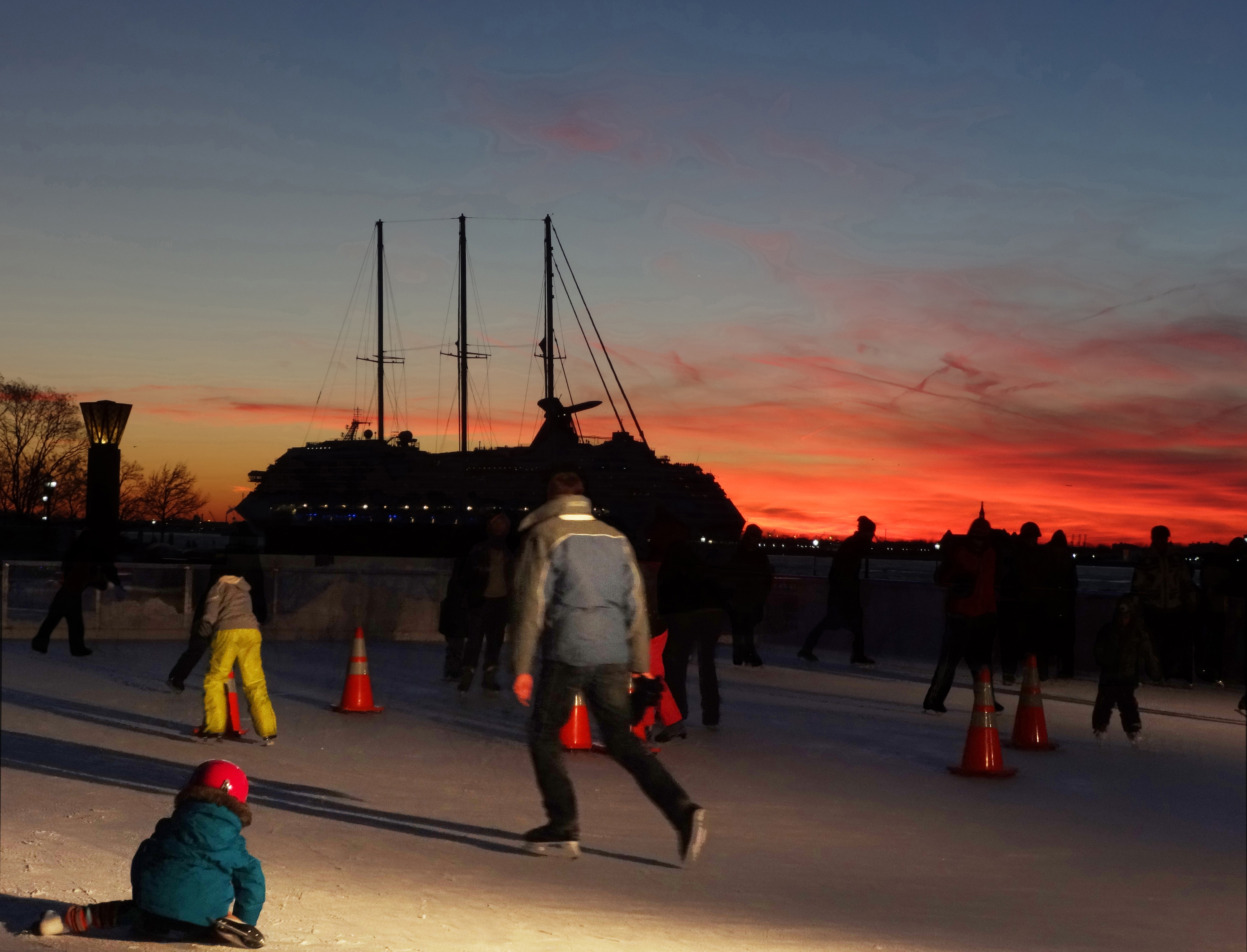 Ice rink and cruise ship sunset