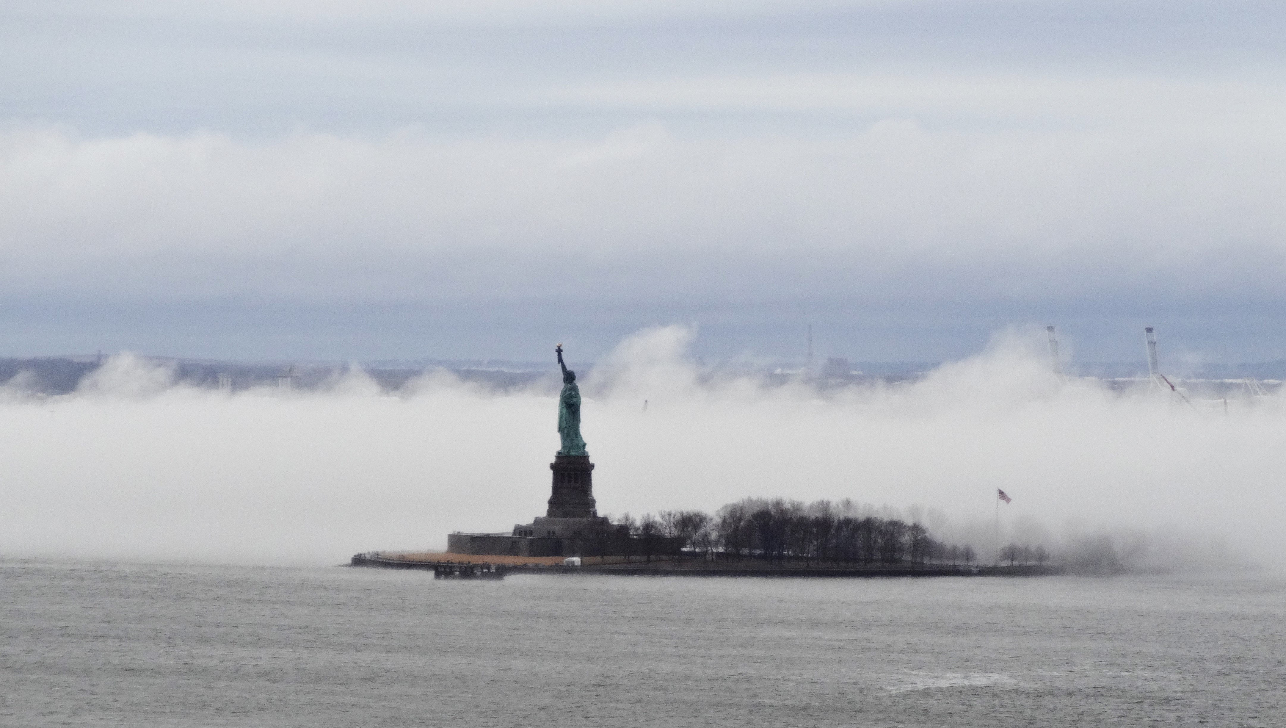 Staue of Liberty with fog at base b 1-11-2014