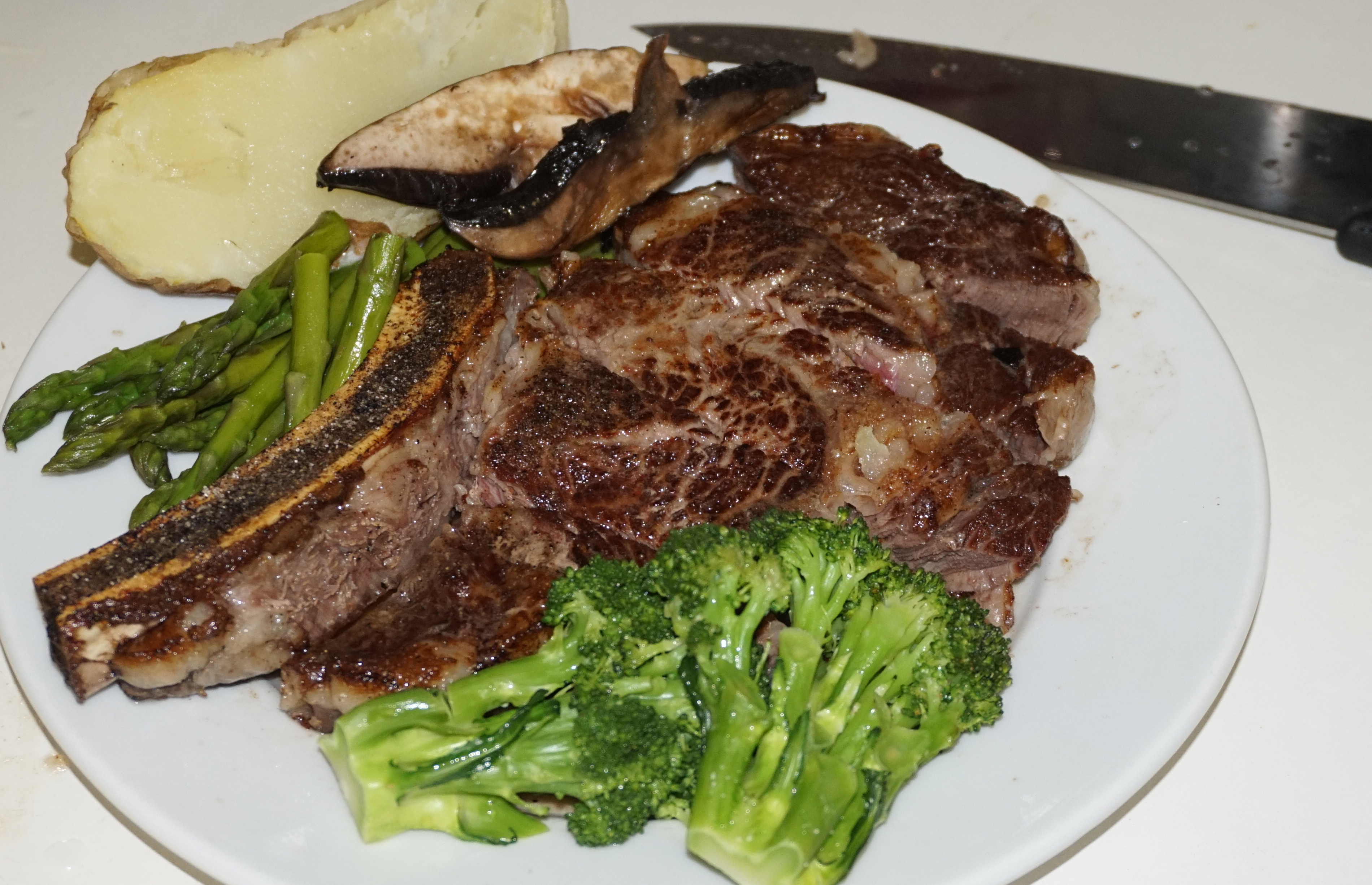 Steak and veggies on plate