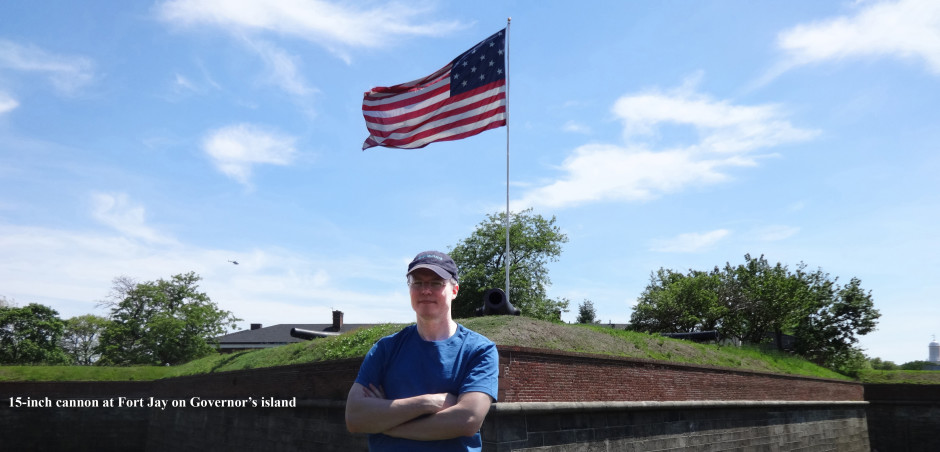 cropped-Patriotic-Greer-by-cannon-and-flag-Governors-Island-21