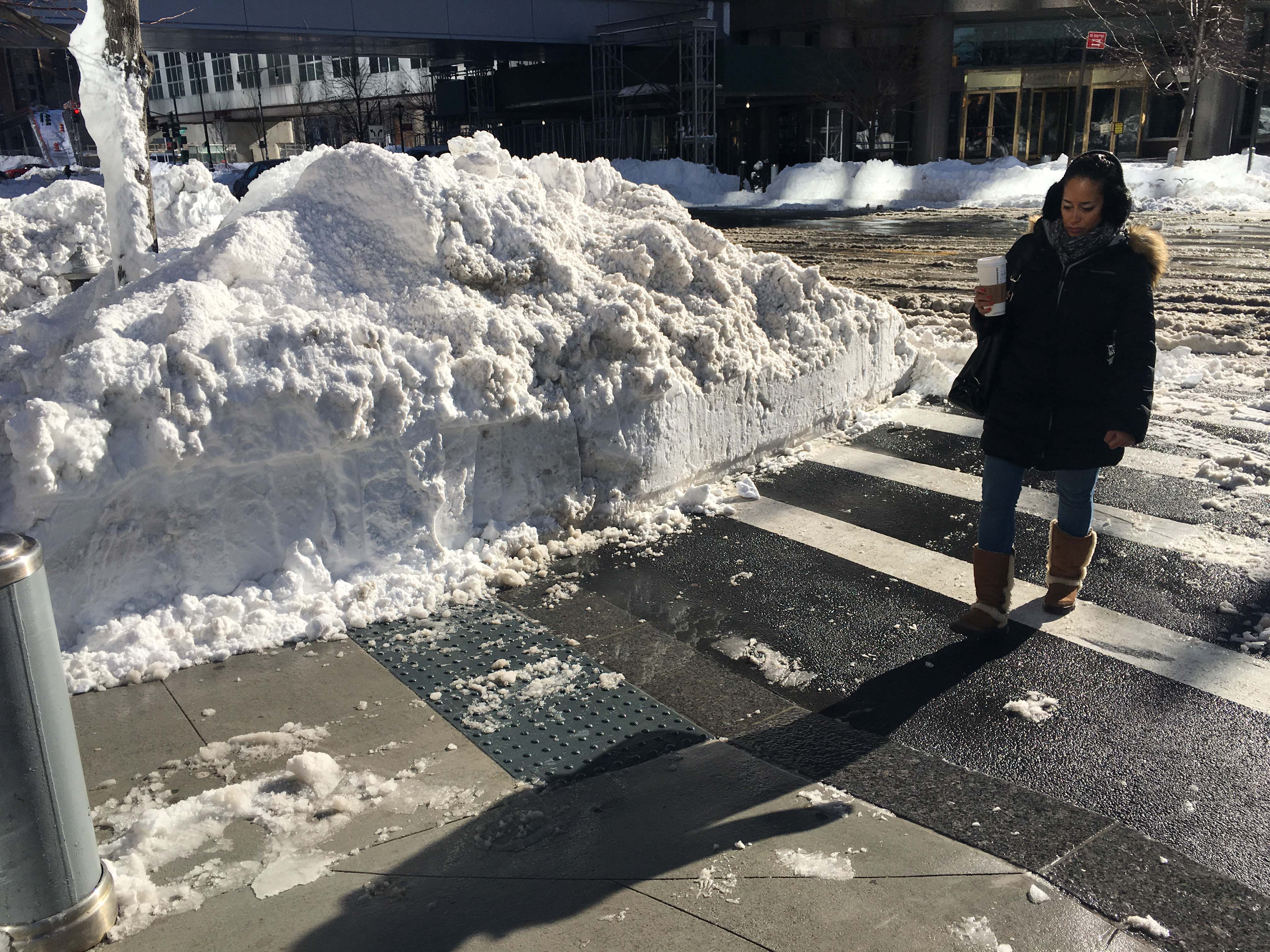 Brookfield circle walkway curb cleared of snow